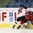 PREROV, CZECH REPUBLIC - JANUARY 10: Switzerland's Rahel Hanggi #18 takes a hit from Japan's Aoi Shiga #22 during preliminary round action at the 2017 IIHF Ice Hockey U18 Women's World Championship. (Photo by Steve Kingsman/HHOF-IIHF Images)

